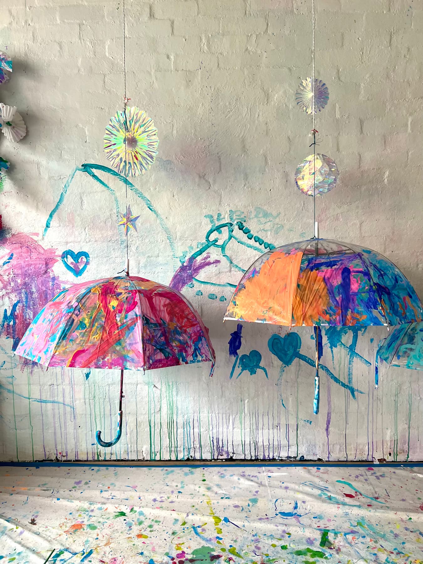 Painted umbrellas installation