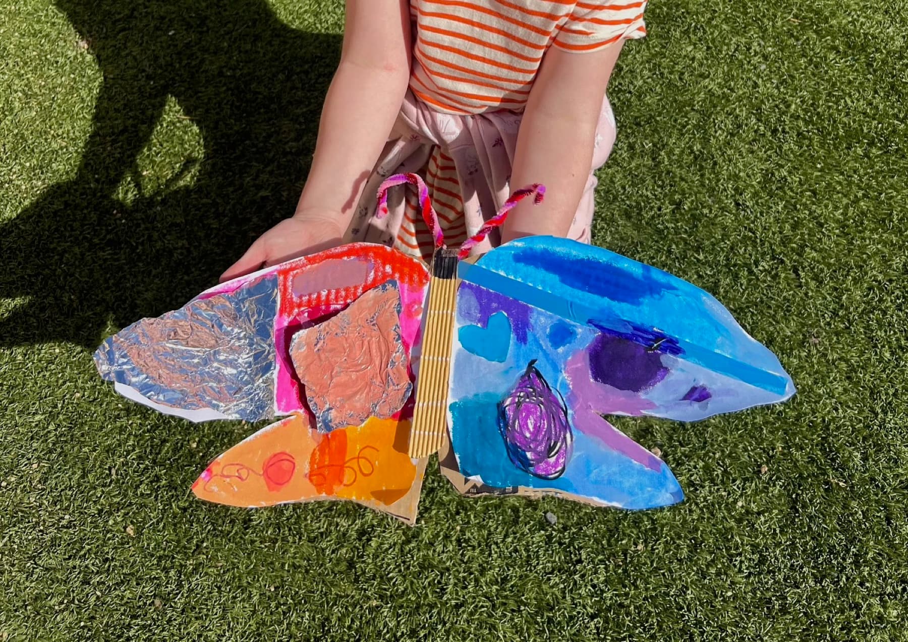 Cardboard butterfly creation at a party