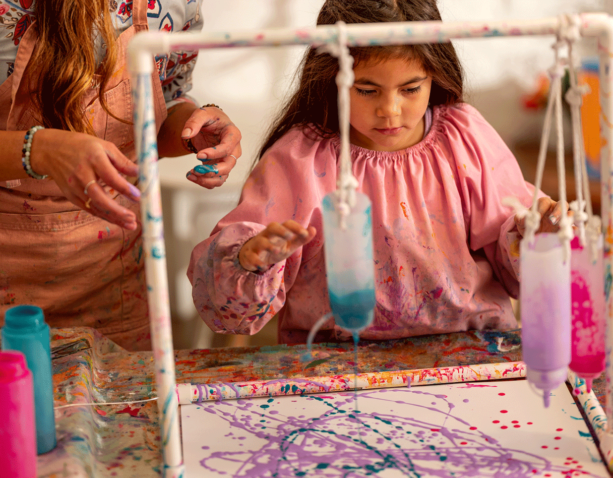 A child painting at the Smudge Artspace studio.